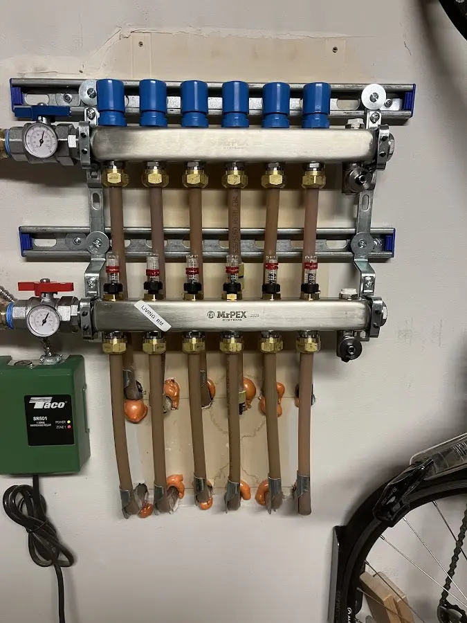 Plumber performing Gas Leak Detection at a residential property in Alpharetta